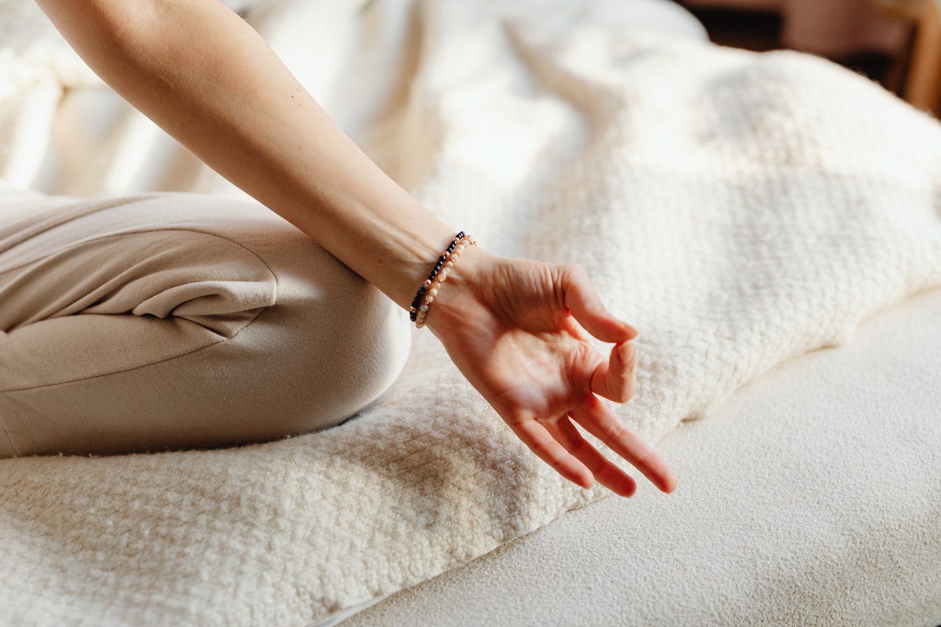 Close Up of Hand of Woman in Yoga Pose